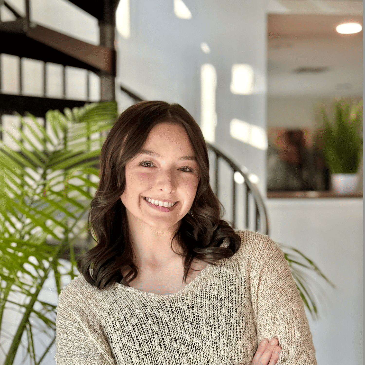 Portrait of Ava Weaver, a professional stylist at Studio Raw Elite, showcasing their expertise and style.